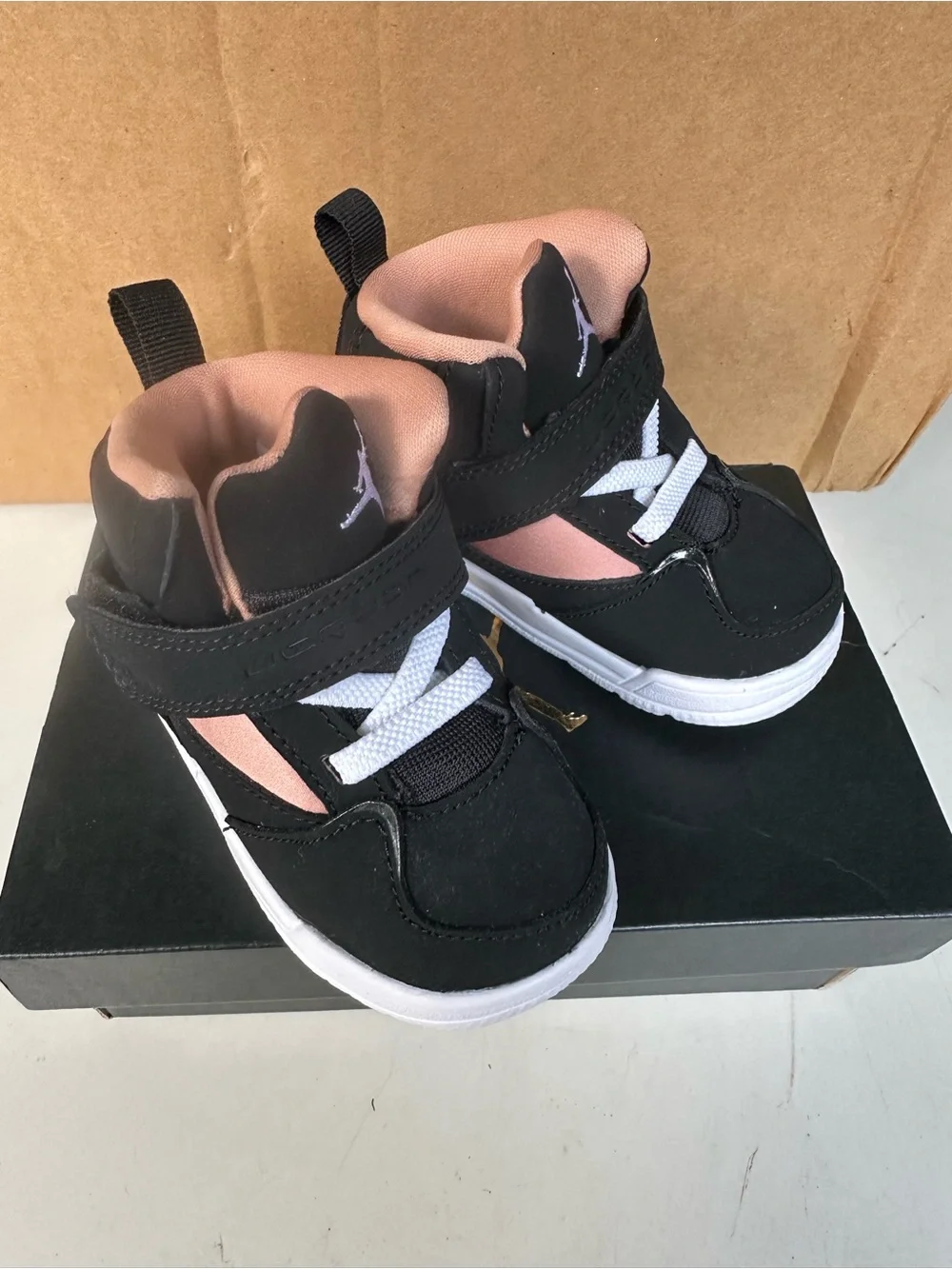 Jordan Kids Black and Pink High-Top Sneakers